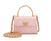 Chanel
Pink Quilted Lambskin Enamel Micro Extra Mini Handle Clutch with Chain Brushed Gold Hardware, 2022