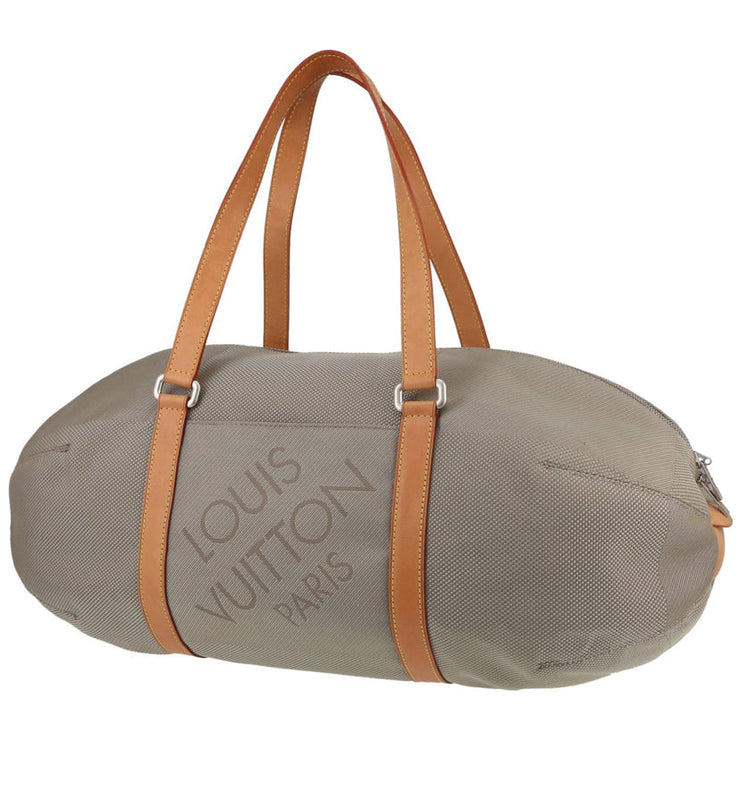 Borsa da viaggio Louis Vuitton Attaquant in tela beige e pelle naturale