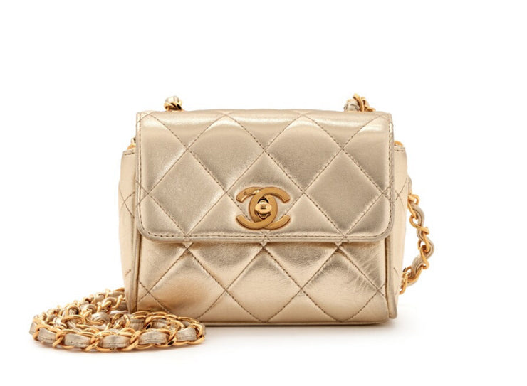 Chanel
Metallic Gold Quilted Lambskin Mini Flap Gold Hardware, 1994-1996