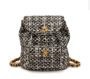 Chanel
Black and White Quilted Sequin Tweed Medium Duma Timeless CC Backpack Gold Hardware, 1994