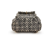 Chanel
Black and White Quilted Sequin Tweed Medium Duma Timeless CC Backpack Gold Hardware, 1994