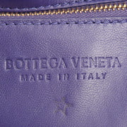 Borsa a tracolla Bottega Veneta Cassette in pelle intrecciata viola