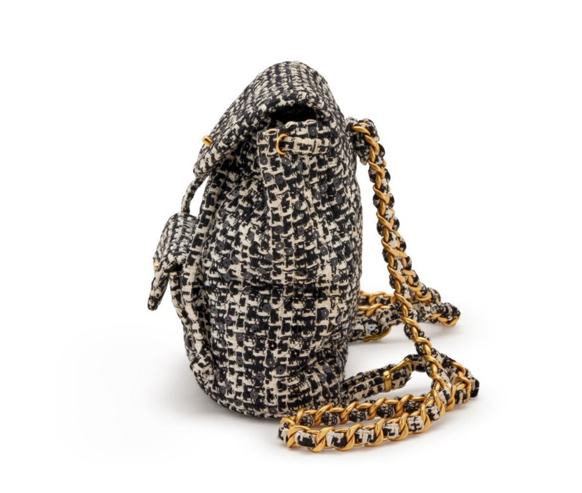 Chanel
Black and White Quilted Sequin Tweed Medium Duma Timeless CC Backpack Gold Hardware, 1994
