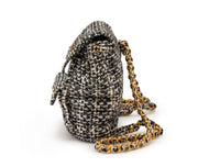 Chanel
Black and White Quilted Sequin Tweed Medium Duma Timeless CC Backpack Gold Hardware, 1994