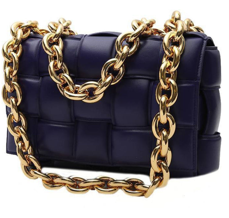 Borsa a tracolla Bottega Veneta Cassette in pelle intrecciata viola