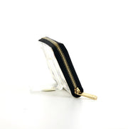 Portafogli Louis Vuitton Zippy in tela monogram cerata color crema con motivo