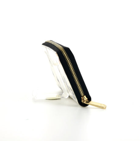 Portafogli Louis Vuitton Zippy in tela monogram cerata color crema con motivo