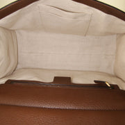 Borsa Gucci GG Marmont in pelle martellata marrone