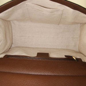 Borsa Gucci GG Marmont in pelle martellata marrone