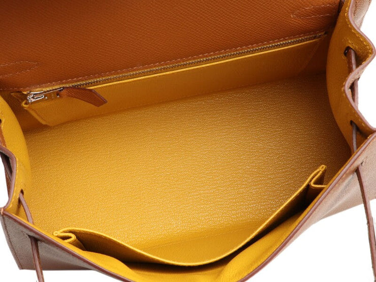 Hermès
Gold Epsom and Jaune Ambre Verso Kelly Sellier 25 Palladium Hardware, 2021