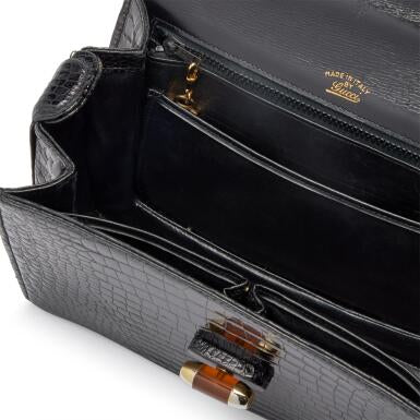 Gucci
Black Crocodile and Bakelite Top Handle Bag Gold Hardware, 1960s