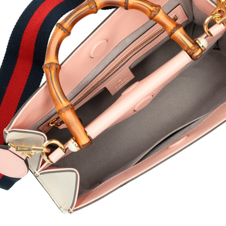 Gucci
Pink and White Calfskin Small Nymphaea Top Handle Bag Gold Hardware