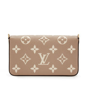 Louis Vuitton
Tourterelle and Crème Monogram Empreinte Pochette Félicie Gold Hardware, 2021