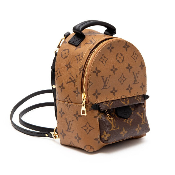 Louis Vuitton
Zaino Ebene Reverse Monogram Coated Canvas Mini Palm Springs Backpack Gold Hardware, 2021
