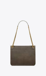 NIKI MEDIA IN PELLE DI AGNELLO MARTELLATA