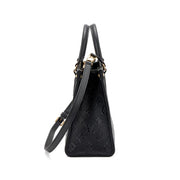 Louis Vuitton Black Giant Monogram Empreinte OnTheGo PM Gold Hardware, 2022